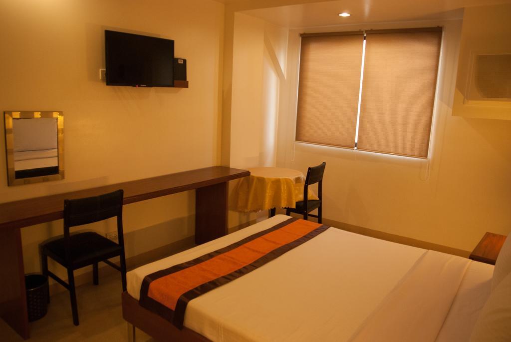 M Suites Hotel Makati City Rom bilde