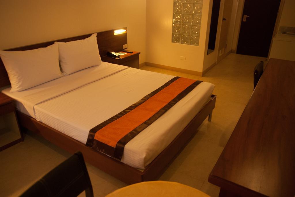 M Suites Hotel Makati City Rom bilde